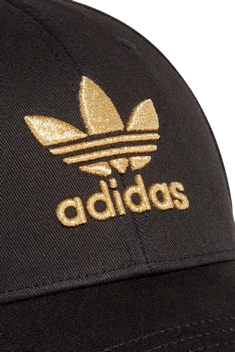 adidas pet zwart goud